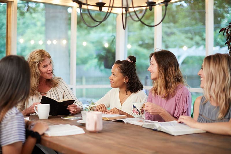 Women studying bible